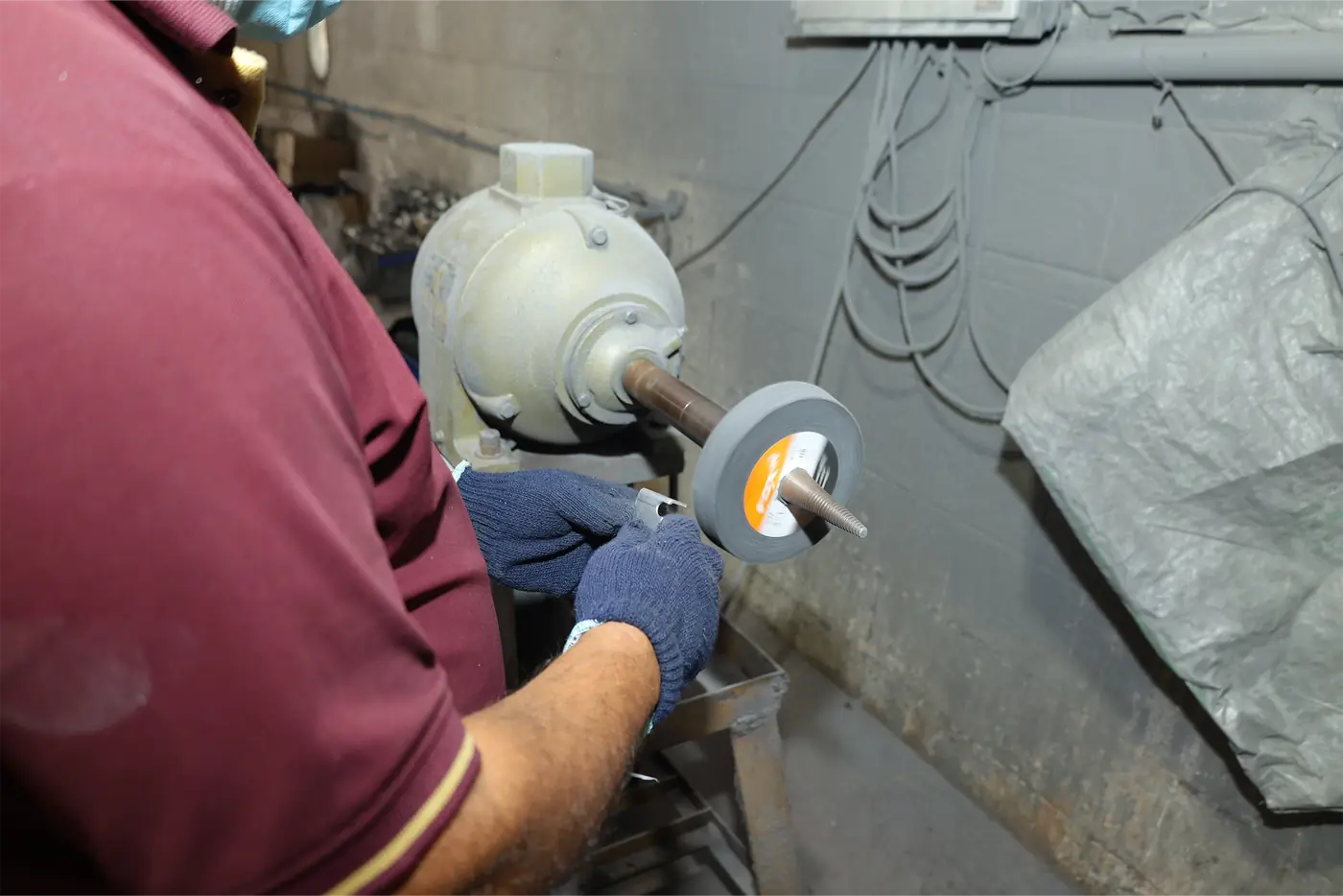 Hand polishing a casting before finishing