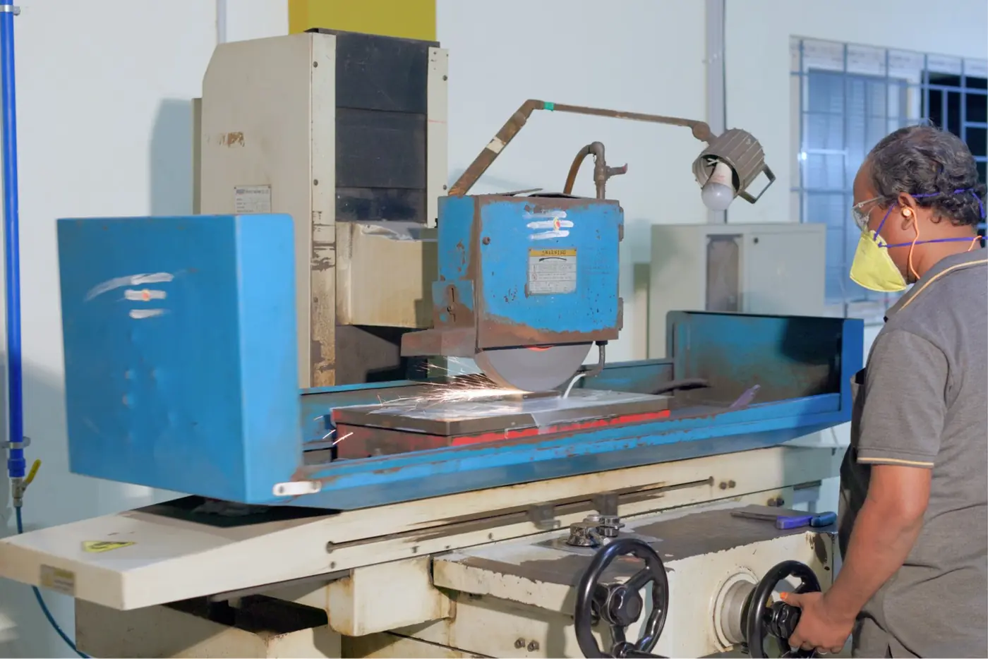 Surface grinding a die plate to size