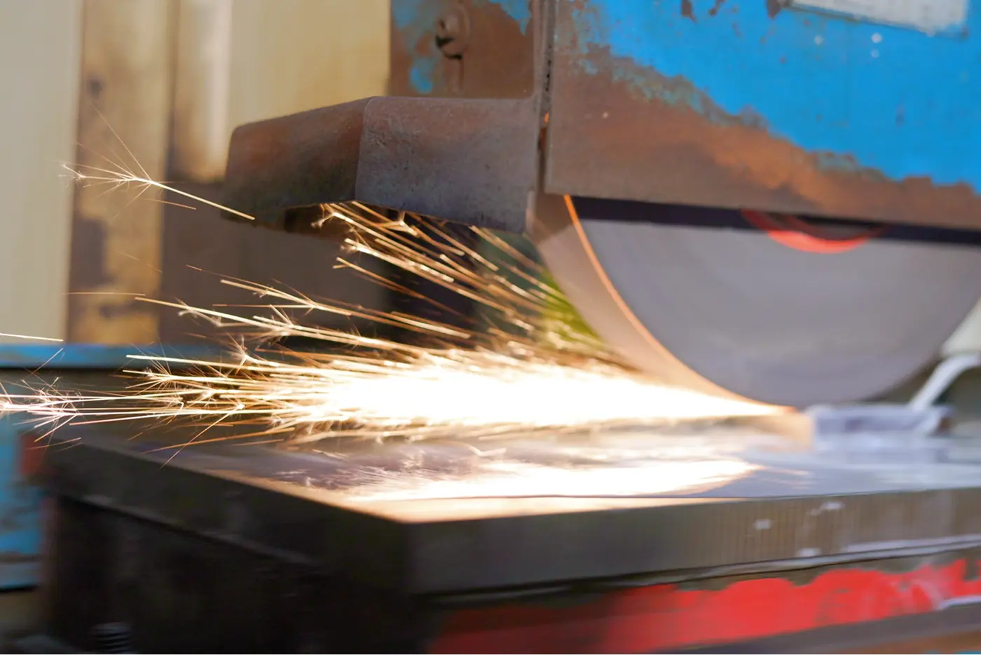 Gates and runners cut from the casting on the abrasive wheel